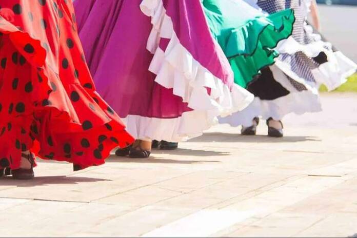 Conocer las tendencias en trajes flamenca 2023 con La